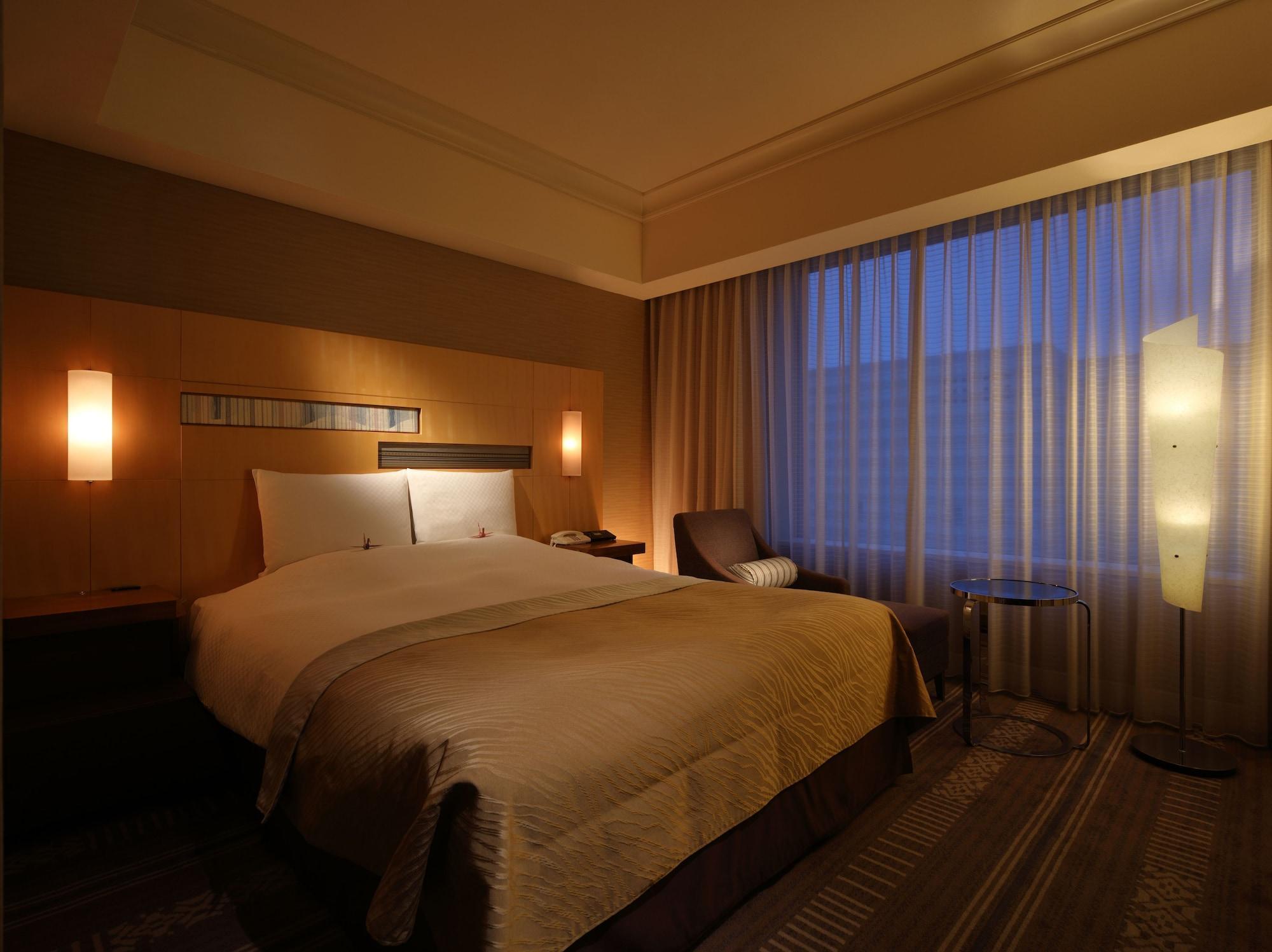 פוקואוקה Hotel Okura Fukuoka מראה חיצוני תמונה A room at the hotel