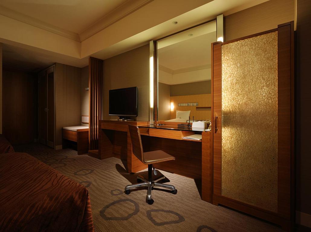 פוקואוקה Hotel Okura Fukuoka מראה חיצוני תמונה A room at the hotel