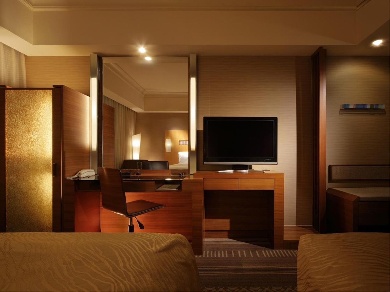 פוקואוקה Hotel Okura Fukuoka מראה חיצוני תמונה A room at the hotel