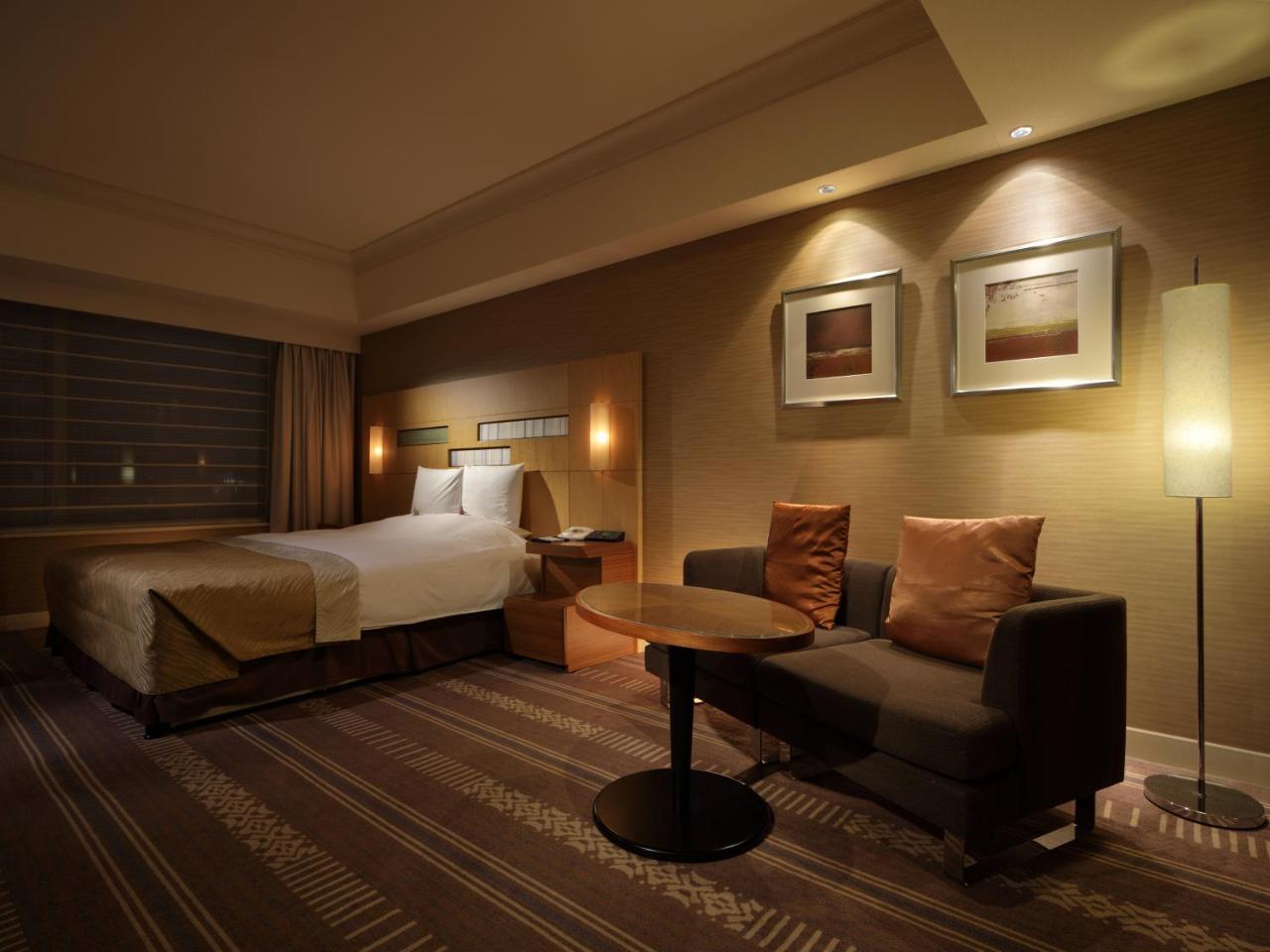 פוקואוקה Hotel Okura Fukuoka מראה חיצוני תמונה A room at the hotel